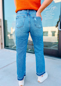 MID RISE SLIM STRAIGHT JEANS WITH RELEASED HEM